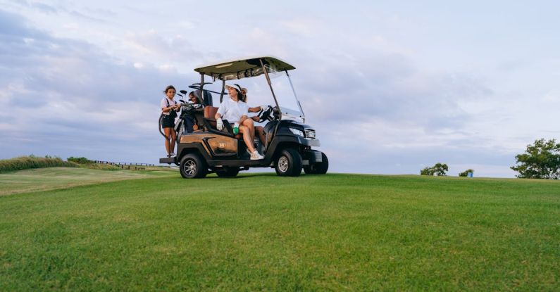 Golf Courses - People Riding a Golf Cart