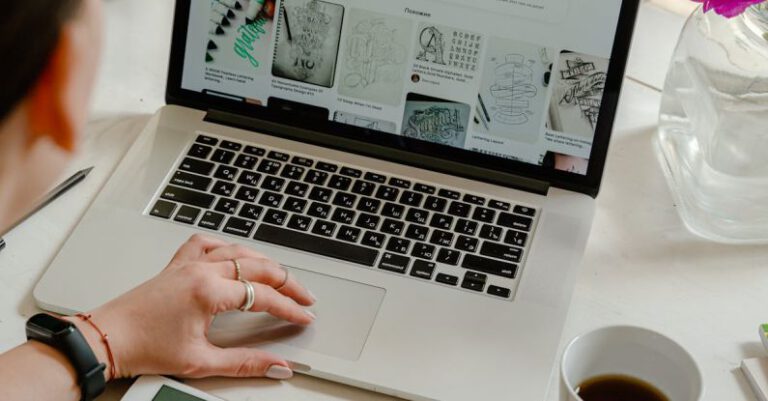 Writing Workshops - Person Using Macbook Pro on Table