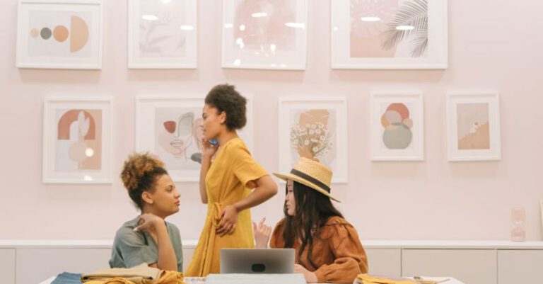 Fashion Designers - People Sitting on Chair in Front of Table