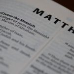 English Civil War - A close up of a bible with the word matthew