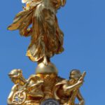 Queen Victoria - Gold Angel Statue Under Blue Sky