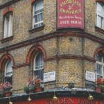 British Pub - Brown and Red Concrete Building