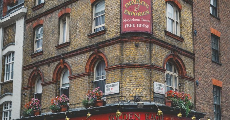 British Pub - Brown and Red Concrete Building