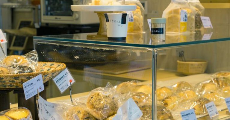 Bakeries - A bakery counter with various types of bread and pastries