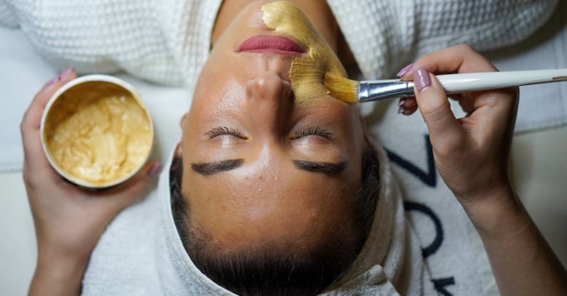 Spas - Woman Doing Facial Mask